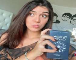 She promotes birthdatecandles which is an astrolog She promotes birthdatecandles which is an astrological organization that read about the stars using numerology, tarot cards, and astrology through her